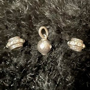 Three Brighton charms with CZ stones.